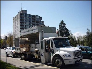 RMRS Truck in front of Apartment Building